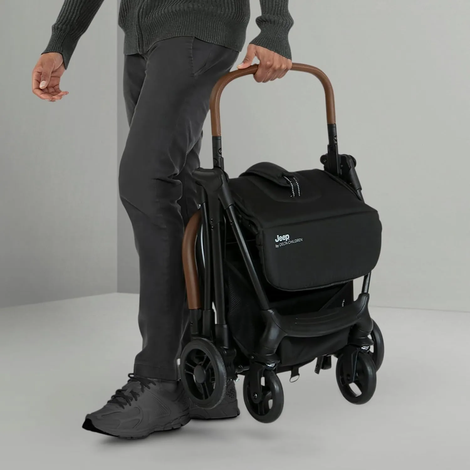 Jeep Altitude Compact Travel Stroller by Delta Children Greenguard Gold, Easy One Hand Fold, Lightweight, Extendable Canopy with Peek-a-Boo Window, Reclining Seat, 4 Wheel Suspension, Black