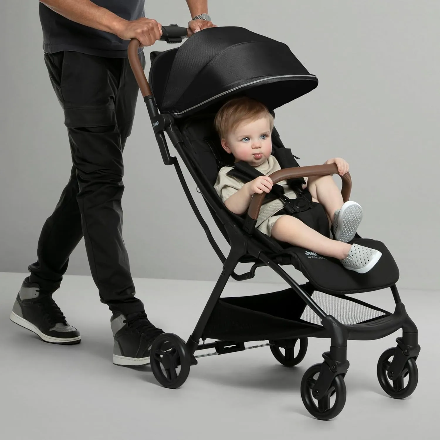 Jeep Altitude Compact Travel Stroller by Delta Children Greenguard Gold, Easy One Hand Fold, Lightweight, Extendable Canopy with Peek-a-Boo Window, Reclining Seat, 4 Wheel Suspension, Black