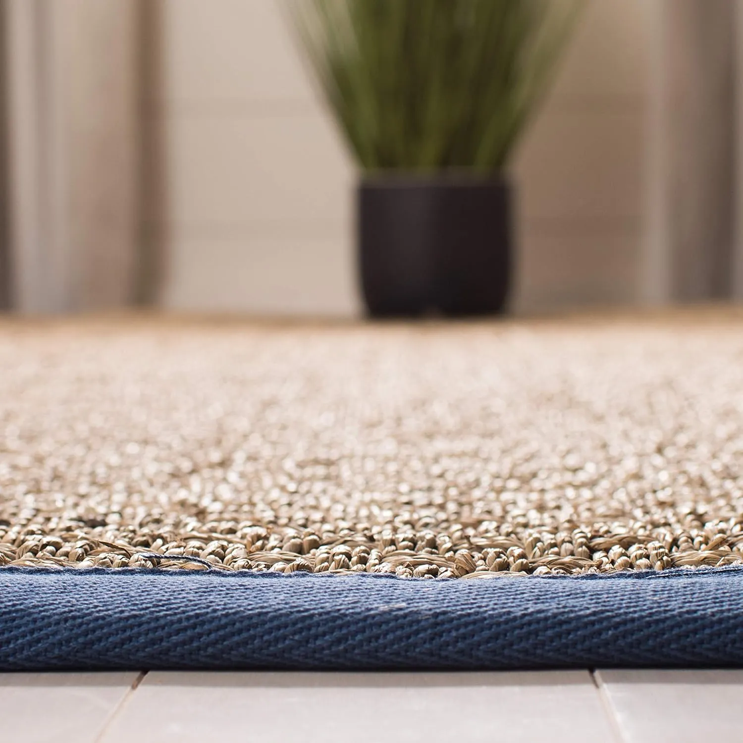 SAFAVIEH Natural Fiber Collection Area Rug - 9' x 12', Natural & Navy, Border Basketweave Seagrass Design, Easy Care, Ideal for High Traffic Areas in Living Room, Bedroom (NF114T)