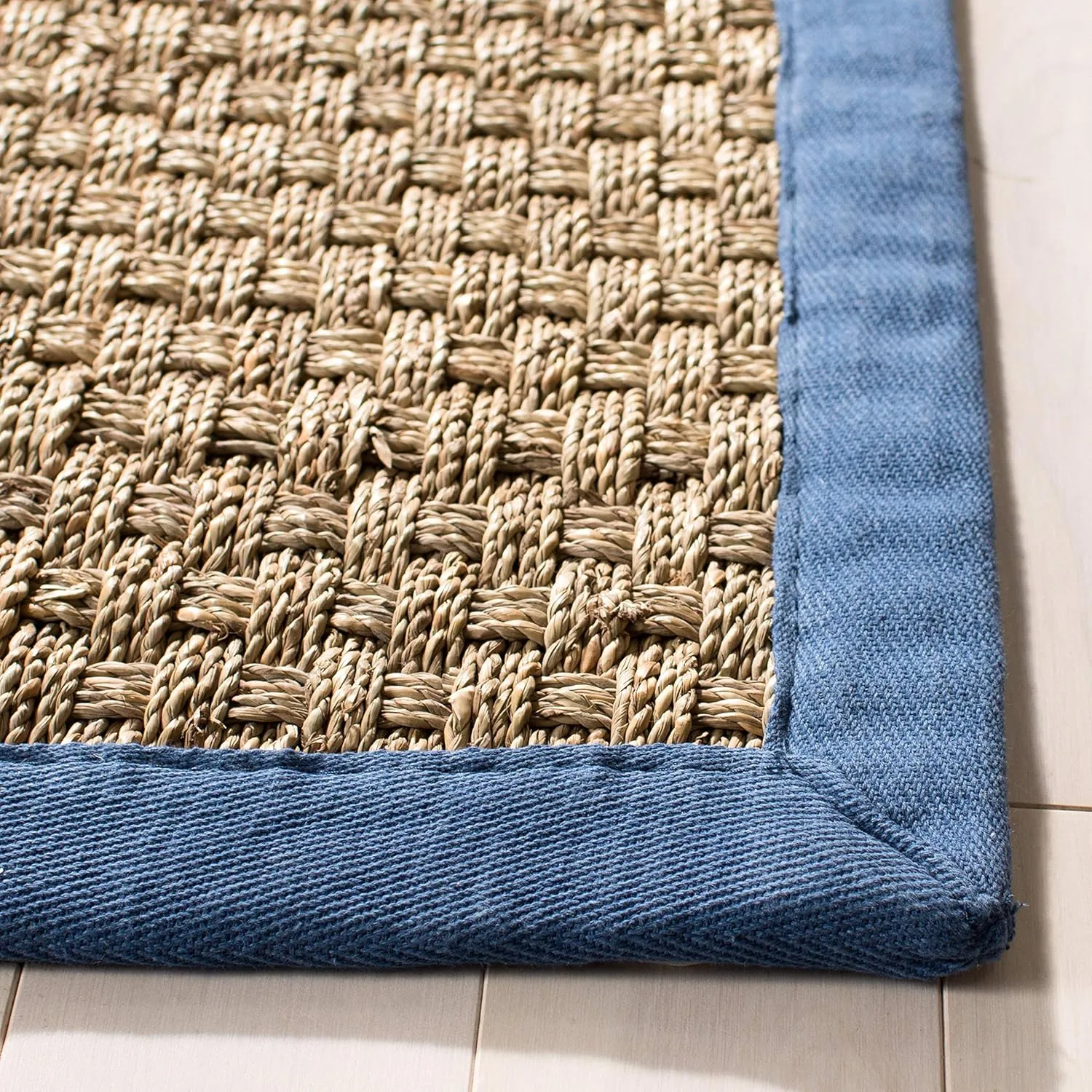 SAFAVIEH Natural Fiber Collection Area Rug - 9' x 12', Natural & Navy, Border Basketweave Seagrass Design, Easy Care, Ideal for High Traffic Areas in Living Room, Bedroom (NF114T)