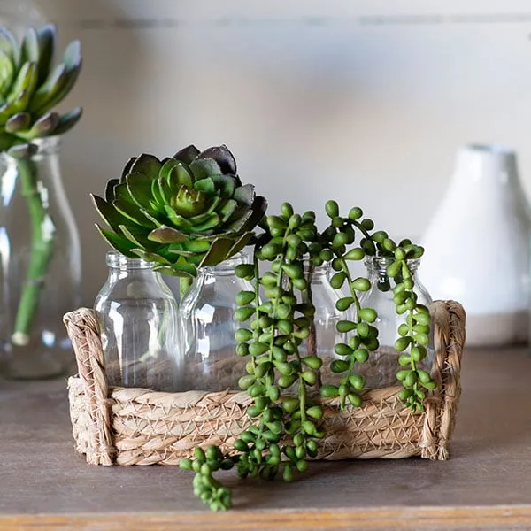 Wicker Basket with Four Milk Bottles